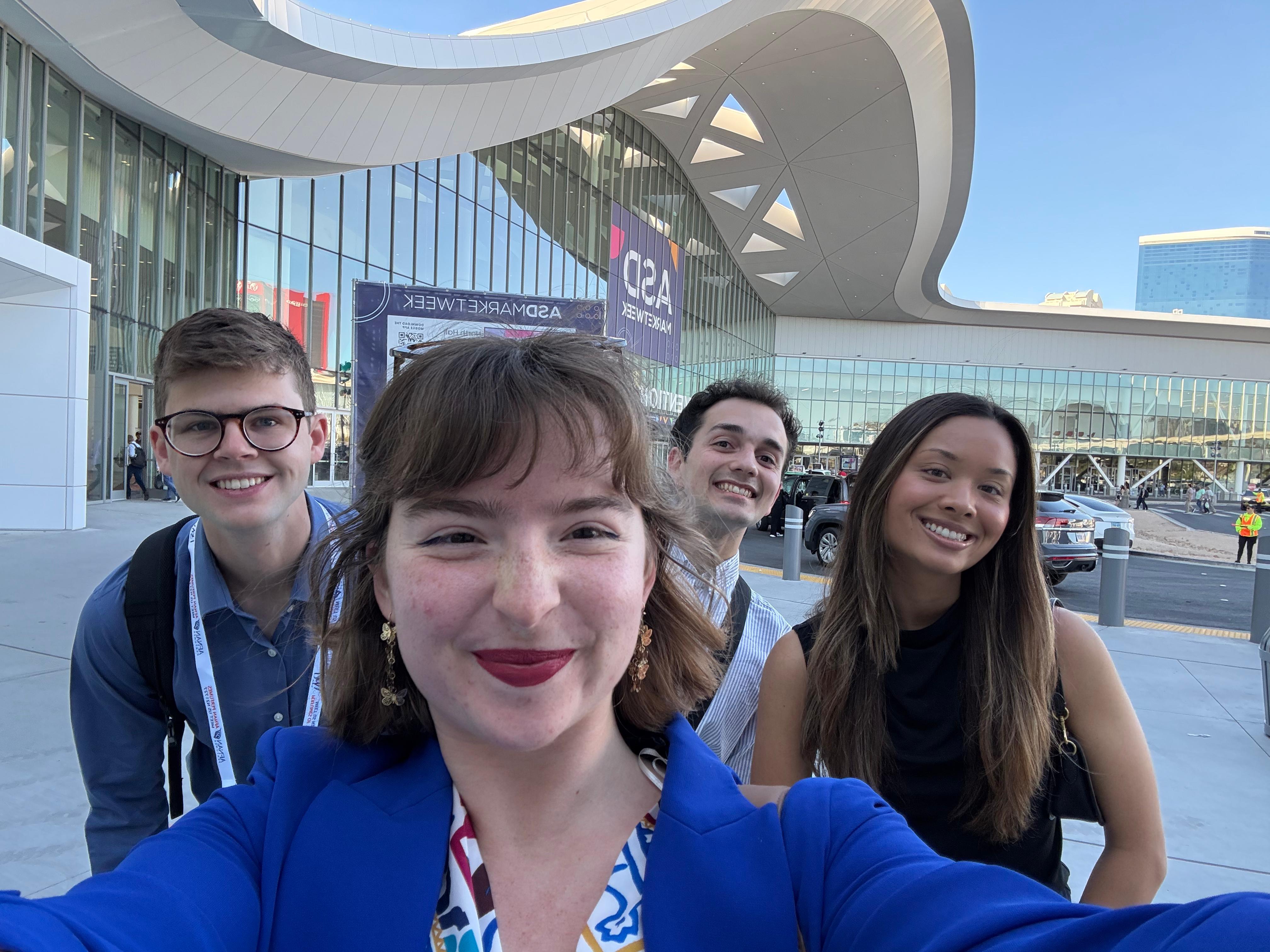 Convexity team outside a conference venue